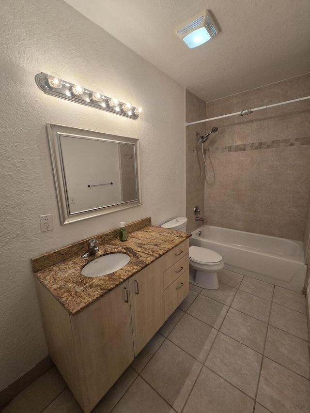 1620 Presidential Way Unit 106, West Palm Beach, FL 33401 - bathroom featuring vanity, shower / washtub combination, tile patterned flooring, and a textured wall