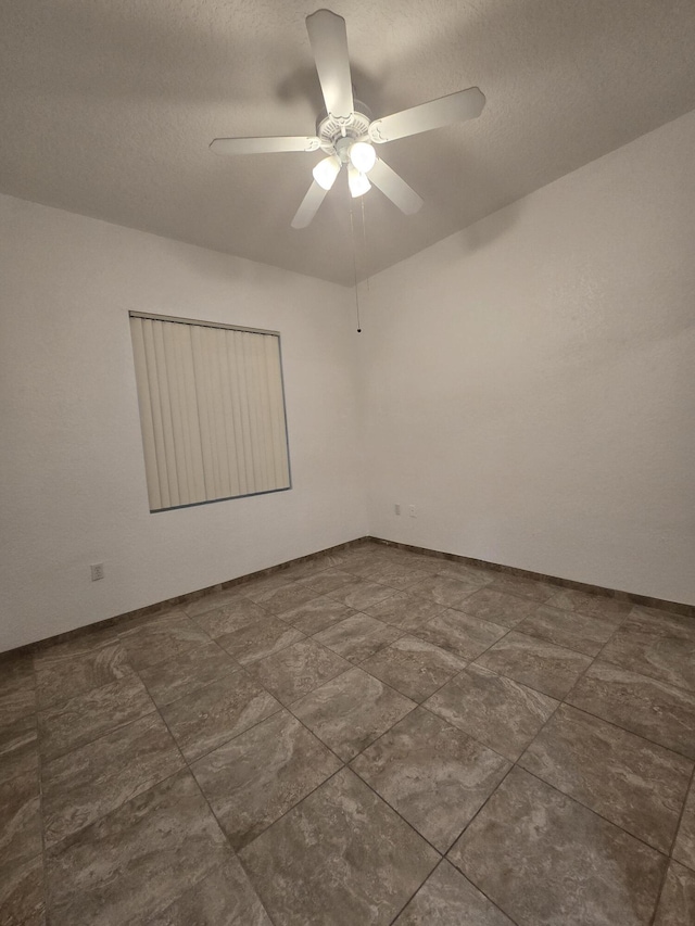 1620 Presidential Way Unit 106, West Palm Beach, FL 33401 - empty room featuring ceiling fan and a textured ceiling