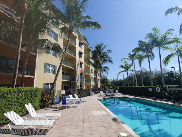 1620 Presidential Way Unit 106, West Palm Beach, FL 33401 - community pool with a patio