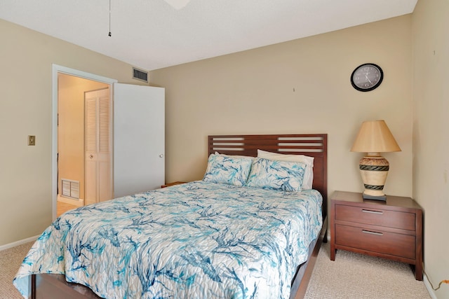 2929 SE Ocean Blvd Unit 108-4, Stuart, FL 34996 - bedroom with light carpet and baseboards