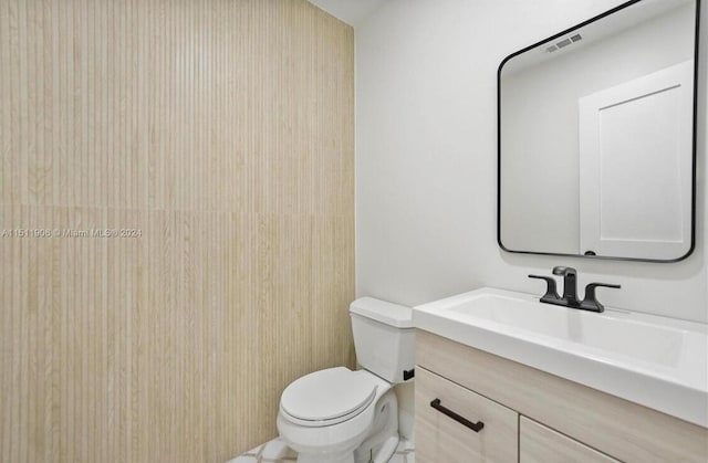 15763 Alexander Run, Jupiter, FL 33478 - bathroom featuring vanity and toilet
