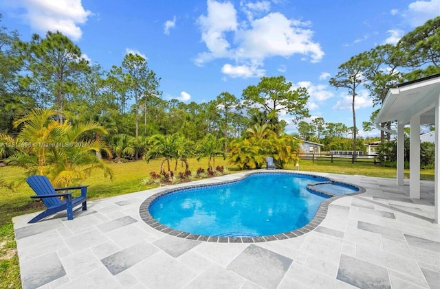 15763 Alexander Run, Jupiter, FL 33478 - view of pool with a patio and a pool with connected hot tub
