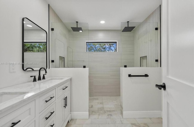 15763 Alexander Run, Jupiter, FL 33478 - full bathroom featuring marble look tile flooring, healthy amount of natural light, double vanity, walk in shower, and recessed lighting