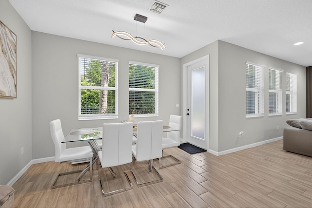 16360 Oakview Dr, Westlake, FL 33470 - dining space featuring light wood-style floors and baseboards