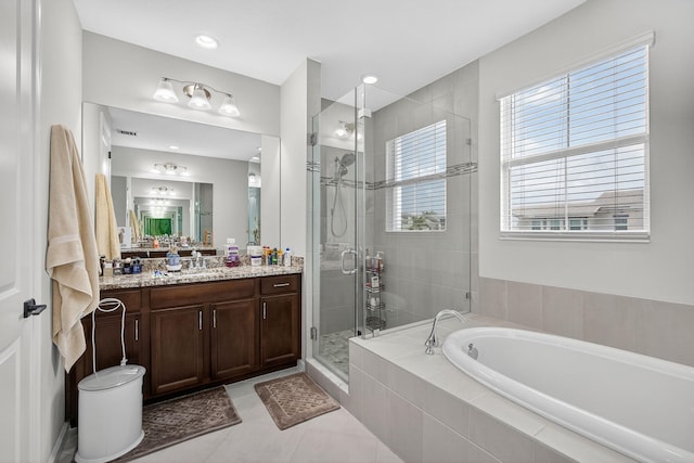 16360 Oakview Dr, Westlake, FL 33470 - bathroom with a garden tub, vanity, a stall shower, healthy amount of natural light, and recessed lighting