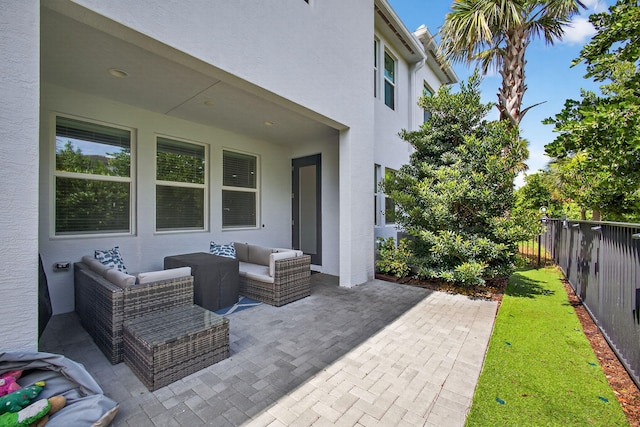 16360 Oakview Dr, Westlake, FL 33470 - fenced backyard with a patio area and an outdoor living space
