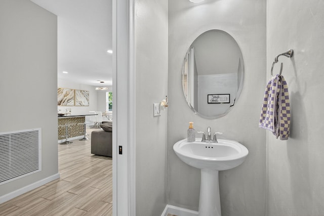 16360 Oakview Dr, Westlake, FL 33470 - bathroom featuring wood finished floors and baseboards