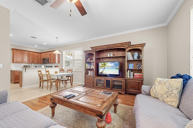 168 Canterbury Pl, Royal Palm Beach, FL 33414 - living room with crown molding, a ceiling fan, light wood finished floors, and recessed lighting