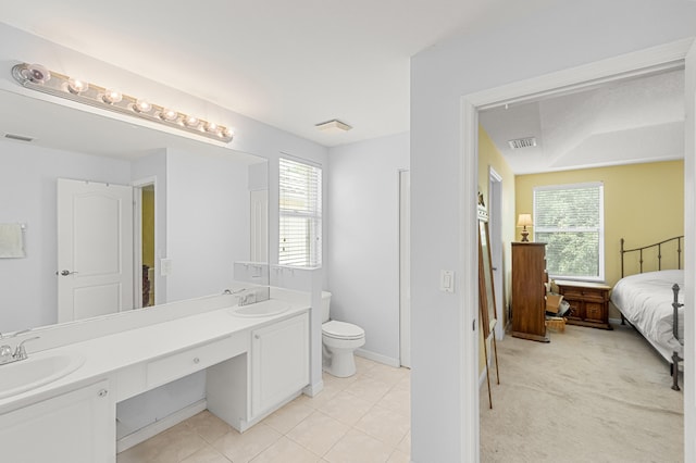 168 Canterbury Pl, Royal Palm Beach, FL 33414 - bathroom featuring double vanity, tile patterned floors, and ensuite bathroom