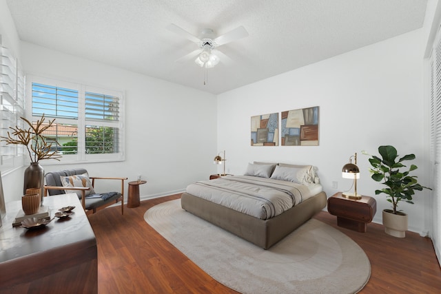 9904 Summerbrook Ter Unit C, Boynton Beach, FL 33437 - bedroom featuring dark wood finished floors and a ceiling fan