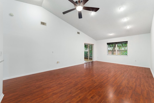 9904 Summerbrook Ter Unit C, Boynton Beach, FL 33437 - spare room with wood finished floors, a ceiling fan, high vaulted ceiling, and a textured ceiling