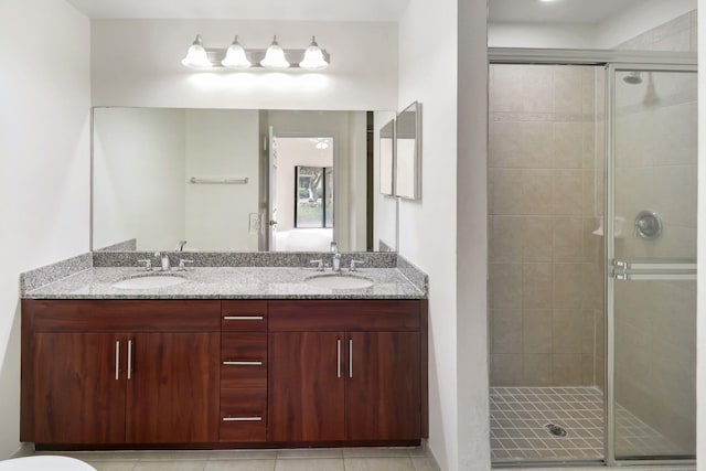 4903 Midtown Ln Unit 3120, Palm Beach Gardens, FL 33418 - full bathroom featuring a stall shower, double vanity, and tile patterned floors