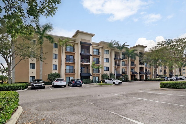 4903 Midtown Ln Unit 3120, Palm Beach Gardens, FL 33418 - view of apartment building / complex with uncovered parking