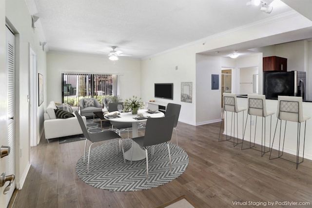4903 Midtown Ln Unit 3120, Palm Beach Gardens, FL 33418 - dining room with crown molding, hardwood / wood-style flooring, ceiling fan, and electric panel