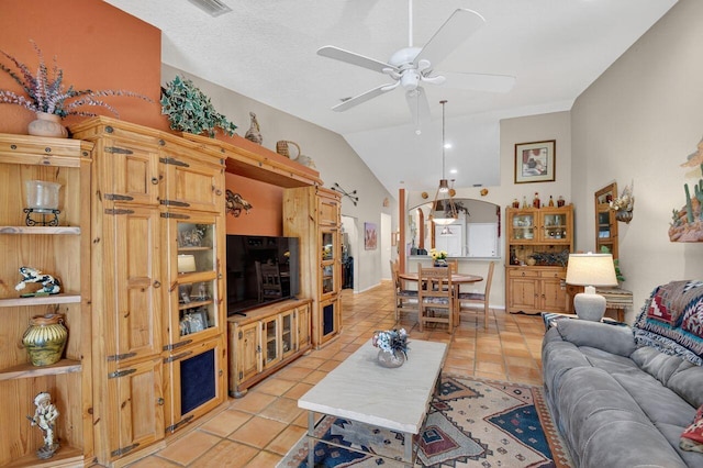 9484 Swansea Ln, West Palm Beach, FL 33411 - living area with ceiling fan, light tile patterned flooring, and lofted ceiling