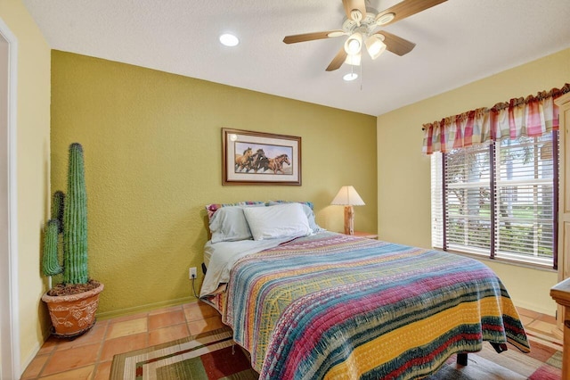 9484 Swansea Ln, West Palm Beach, FL 33411 - tiled bedroom with a ceiling fan and recessed lighting