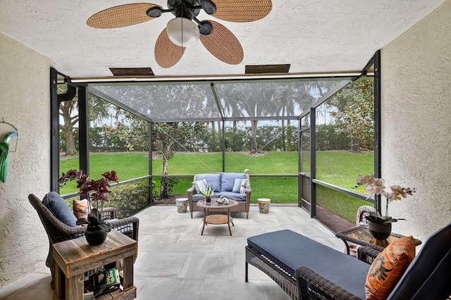 9484 Swansea Ln, West Palm Beach, FL 33411 - sunroom with a ceiling fan and an outdoor living space