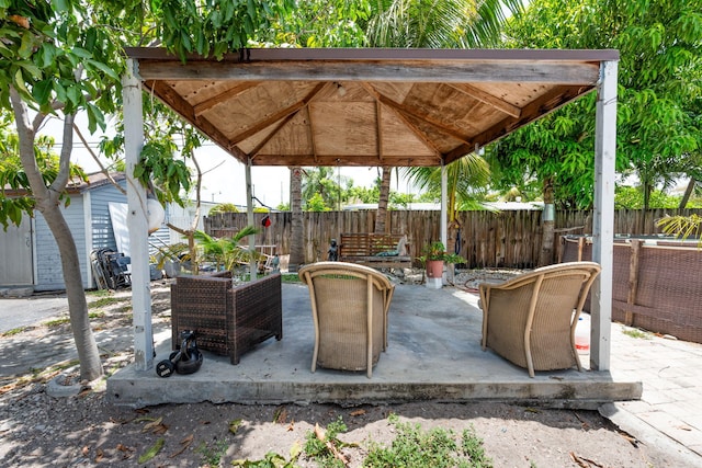 4740 NE 17th Ave, Pompano Beach, FL 33064 - fenced backyard featuring a patio area and a gazebo
