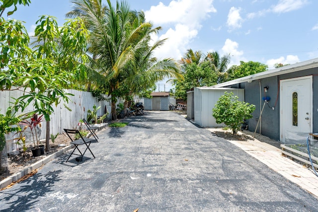 4740 NE 17th Ave, Pompano Beach, FL 33064 - view of patio / terrace with a storage shed