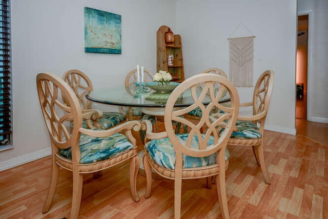 45 Birch Pl, Tequesta, FL 33469 - dining area with wood finished floors