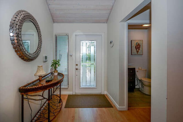 45 Birch Pl, Tequesta, FL 33469 - entryway with wood finished floors, wood ceiling, and vaulted ceiling