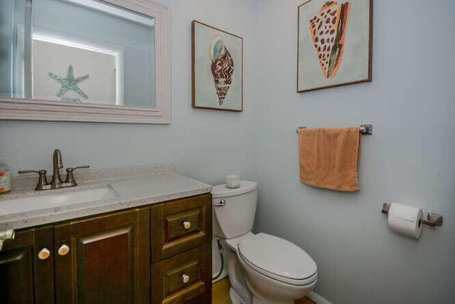 45 Birch Pl, Tequesta, FL 33469 - bathroom with vanity and toilet