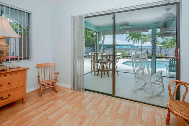 45 Birch Pl, Tequesta, FL 33469 - doorway with wood finished floors and plenty of natural light
