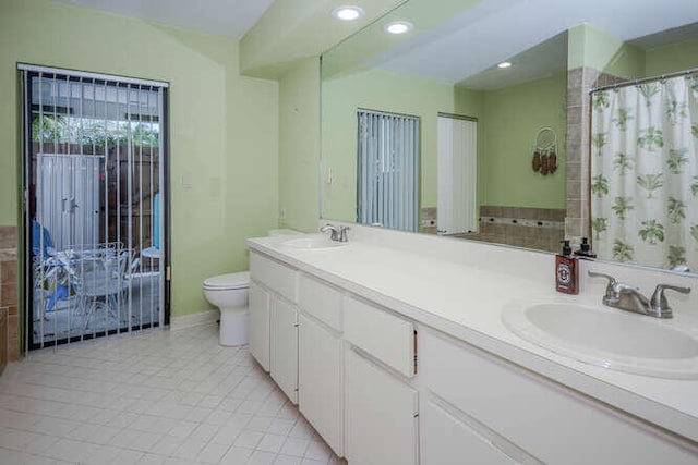 45 Birch Pl, Tequesta, FL 33469 - bathroom featuring double vanity, tile patterned floors, recessed lighting, and a shower with curtain
