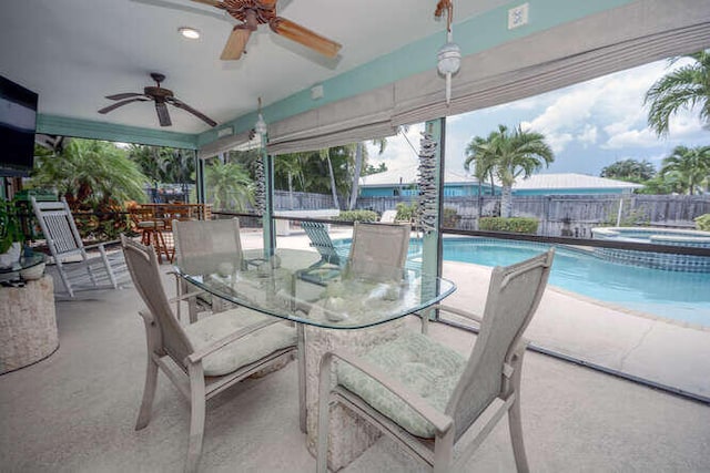 45 Birch Pl, Tequesta, FL 33469 - fenced backyard featuring outdoor dining area, a ceiling fan, a patio, and a pool with connected hot tub