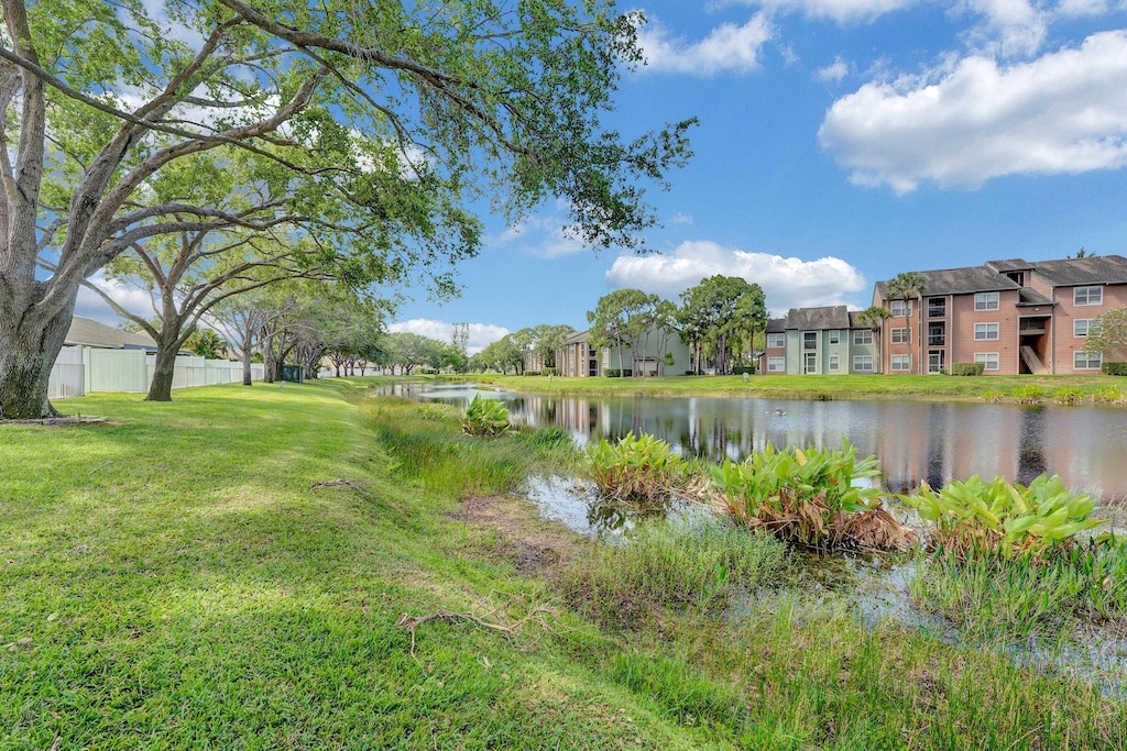 4561 Discovery Ln Unit 14, West Palm Beach, FL 33417 - water view featuring nearby suburban area