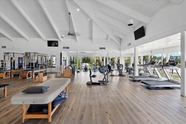 11863 Wimbledon Cir Unit 438, Wellington, FL 33414 - workout area featuring high vaulted ceiling, wood finished floors, and a wood ceiling with exposed beams
