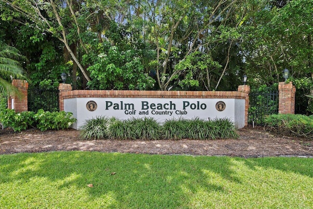 11863 Wimbledon Cir Unit 438, Wellington, FL 33414 - community / neighborhood sign featuring a lawn