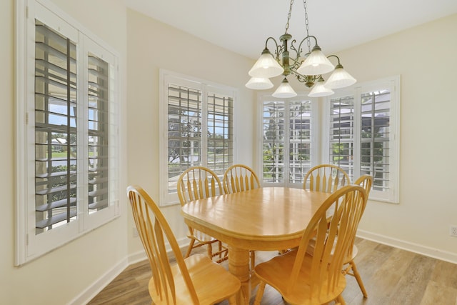 2000 SW Oakwater Pt, Palm City, FL 34990 - dining area featuring wood finished floors