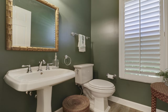 2000 SW Oakwater Pt, Palm City, FL 34990 - bathroom featuring toilet and wood finished floors