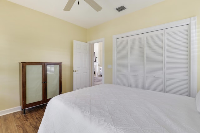 2000 SW Oakwater Pt, Palm City, FL 34990 - bedroom featuring wood finished floors, a closet, and ceiling fan