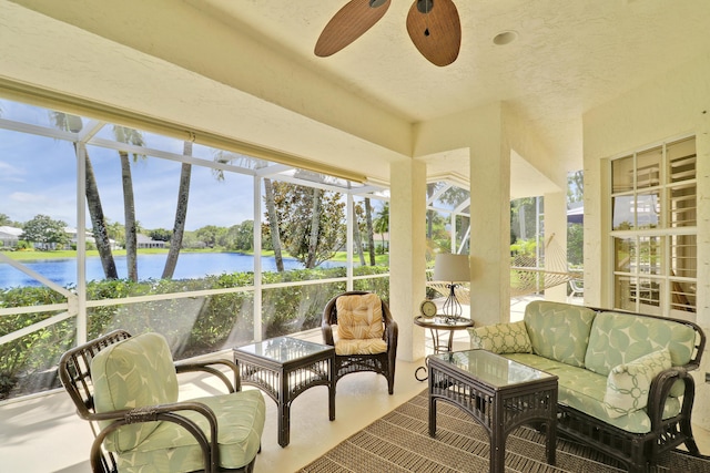 2000 SW Oakwater Pt, Palm City, FL 34990 - sunroom / solarium with ceiling fan, a water view, and an outdoor living space