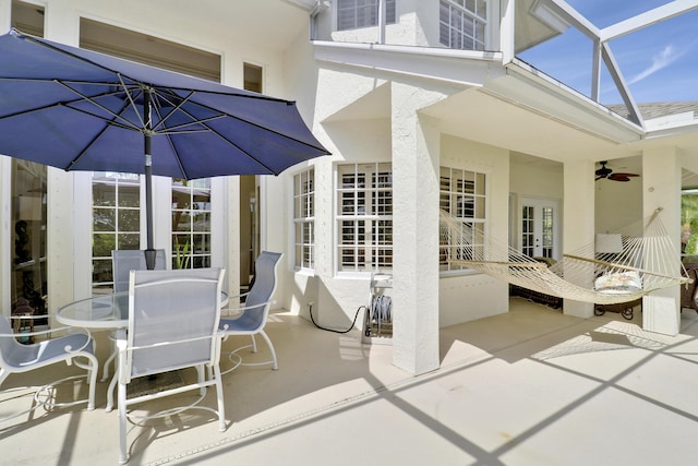 2000 SW Oakwater Pt, Palm City, FL 34990 - view of patio / terrace with outdoor dining area and a ceiling fan