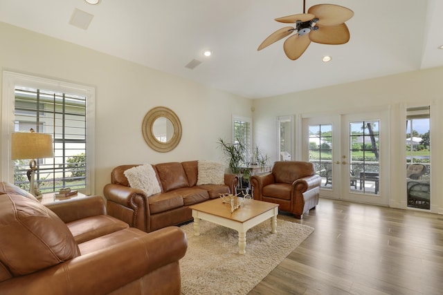 2000 SW Oakwater Pt, Palm City, FL 34990 - living room with plenty of natural light, a ceiling fan, wood finished floors, and recessed lighting