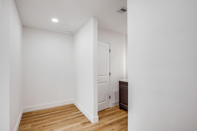 701 37th St, West Palm Beach, FL 33407 - hall with light wood finished floors, attic access, and recessed lighting