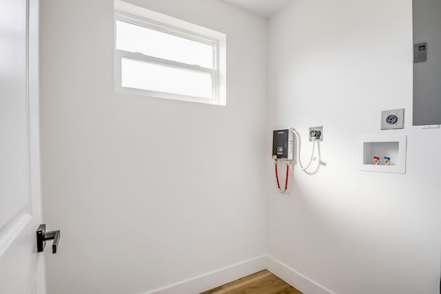 701 37th St, West Palm Beach, FL 33407 - laundry room with electric dryer hookup, washer hookup, and light wood finished floors