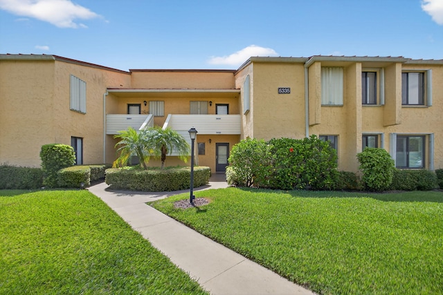 5335 SE Miles Grant Rd Unit 102, Stuart, FL 34997 - view of building exterior