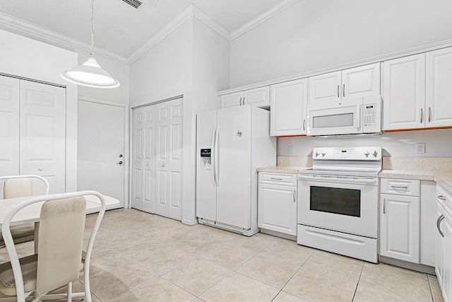 9331 Bridgeport Dr, Royal Palm Beach, FL 33411 - kitchen featuring white appliances, ornamental molding, light countertops, light tile patterned floors, and white cabinetry