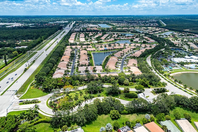 9331 Bridgeport Dr, Royal Palm Beach, FL 33411 - aerial overview of property's location featuring a large body of water and nearby suburban area