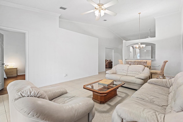 9331 Bridgeport Dr, Royal Palm Beach, FL 33411 - living room featuring light tile patterned flooring, a ceiling fan, a chandelier, crown molding, and lofted ceiling