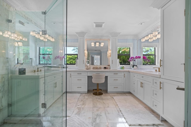 6204 Celadon Cir, Palm Beach Gardens, FL 33418 - bathroom with plenty of natural light, crown molding, a chandelier, vanity, and marble finish flooring