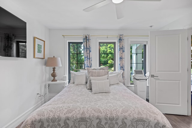 6204 Celadon Cir, Palm Beach Gardens, FL 33418 - bedroom featuring wood finished floors and ceiling fan