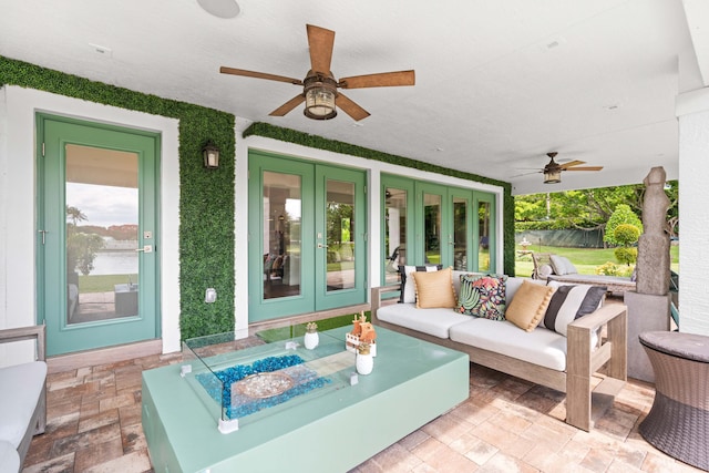 6204 Celadon Cir, Palm Beach Gardens, FL 33418 - view of patio / terrace featuring french doors, ceiling fan, and an outdoor living space