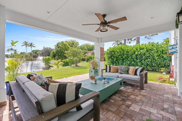 6204 Celadon Cir, Palm Beach Gardens, FL 33418 - view of patio / terrace with an outdoor hangout area, a water view, and a ceiling fan