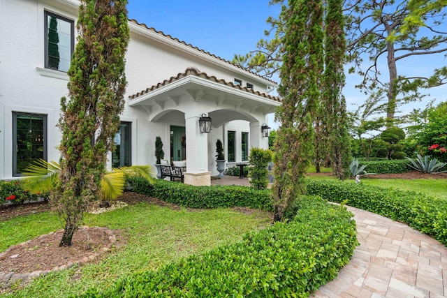 6204 Celadon Cir, Palm Beach Gardens, FL 33418 - back of property with covered porch and stucco siding