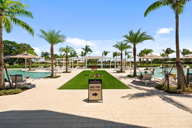 6204 Celadon Cir, Palm Beach Gardens, FL 33418 - surrounding community with a swimming pool and a patio area